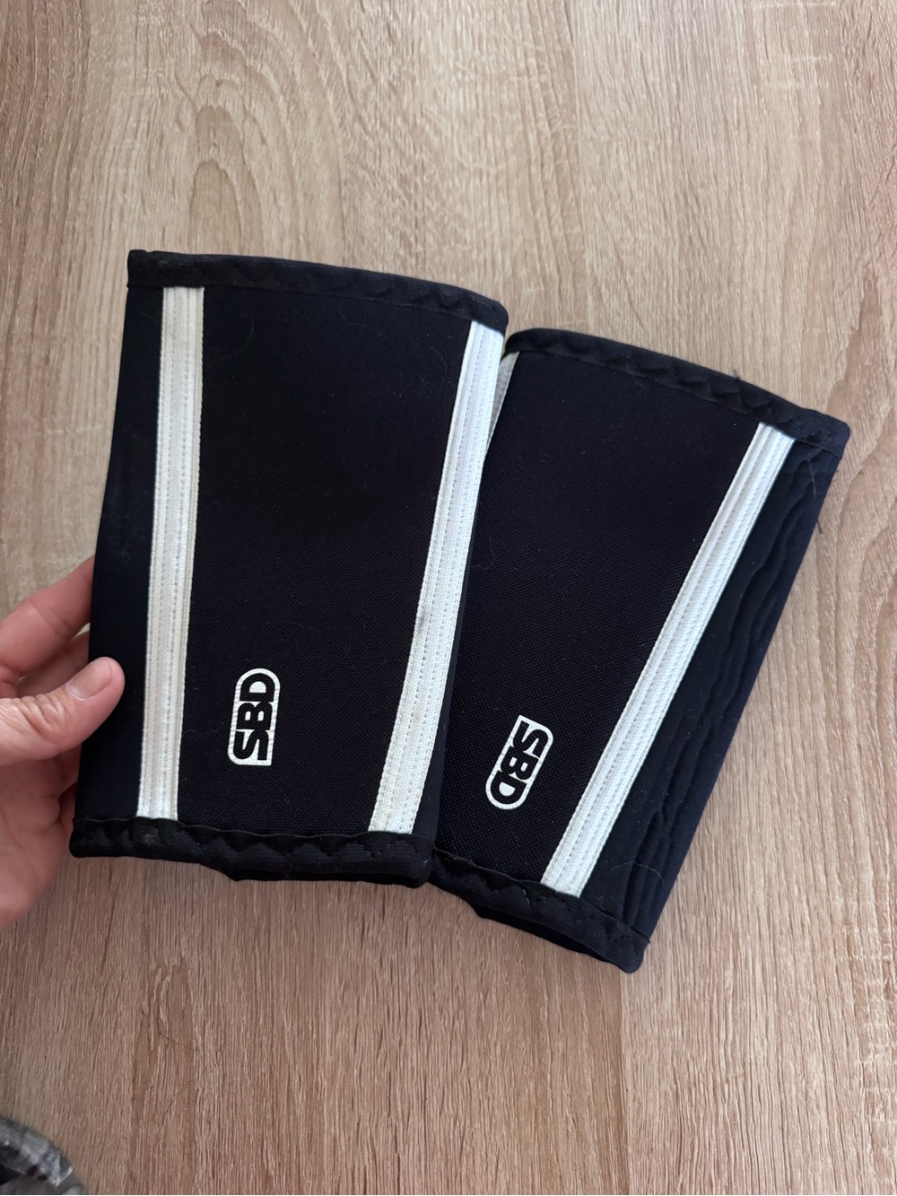 SBD Black elbow sleeves with White Stripe small